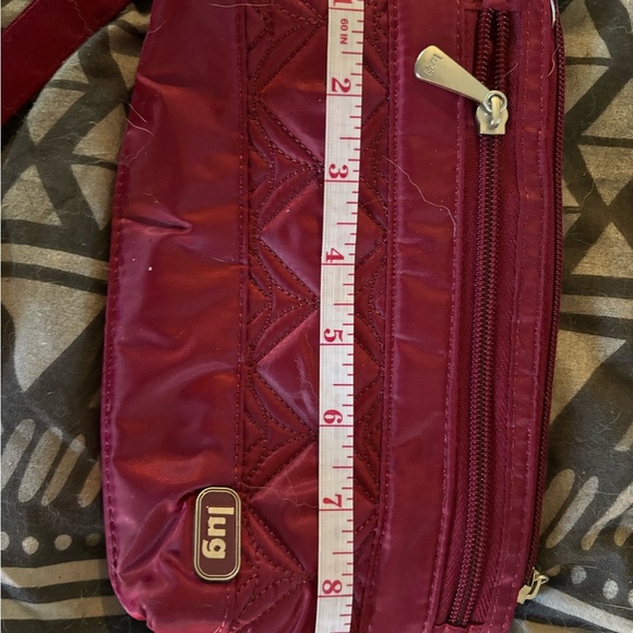 Lug Red Quilted Wristlet Clutch with waterproof interior. - Picture 1 of 5